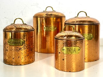 A Set Of 4 Vintage Copper Kitchen Canisters