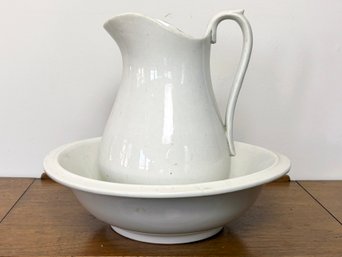 An Antique Porcelain Wash Basin And Pitcher