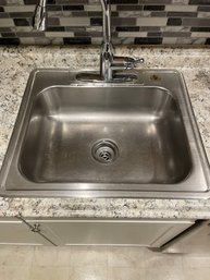 A Stainless Steel Kitchen Sink