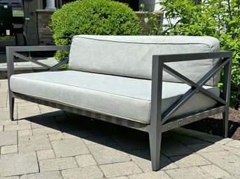 A Modern Outdoor Loveseat With Linen Cushion And Covers By Restoration Hardware