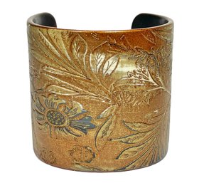 Designer Molded Plastic Cuff Bracelet Having Impressed Flowers