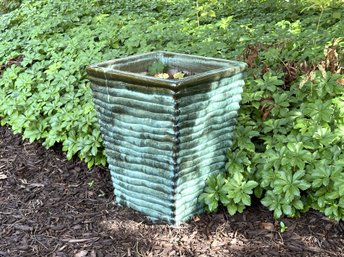 A Large Planter In Glazed Terracotta