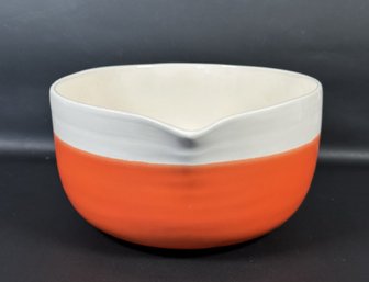 A Fun Ceramic Mixing Bowl In Orange & White By Crate & Barrel