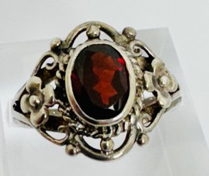 VINTAGE STERLING SILVER AND GARNET RING