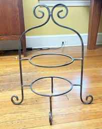 A Wrought Iron Tiered Serving Stand