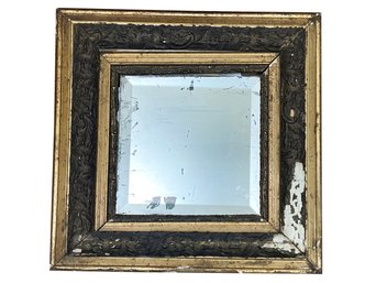 An Antique Gilt And Plaster Beveled Mirror