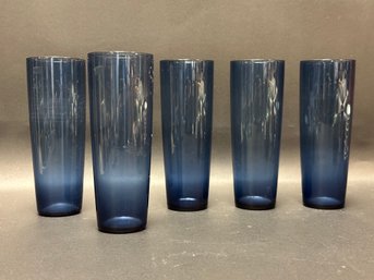 A Set Of Five Tall Beverage Glasses In Blue