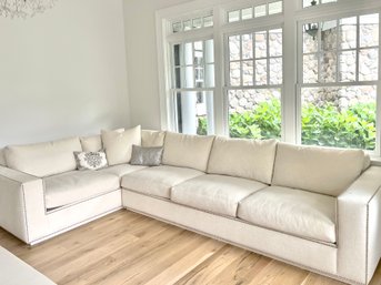 A Two Piece L Shaped Tuxedo Style Sectional Sofa With Nailhead Trim