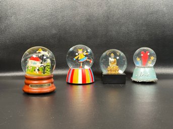 A Small Collection Of Musical & Other Snow Globes