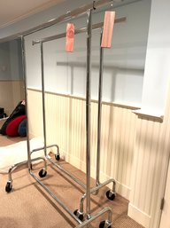 A Pair Of Very Nice Sturdy Rolling Clothes Racks