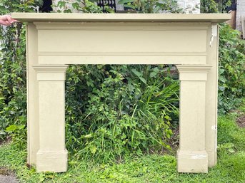 An Antique Wood Fireplace Mantle