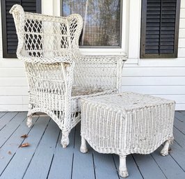 A Vintage Wicker Armchair And Ottoman