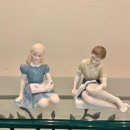 A Pair Of Royal Dalton Figurines - Treasure Isand & Alice In Wonderland