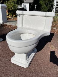 An American Standard MCM Lowboy Toilet