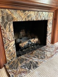 A Rainforest Brown Marble Hearth And Fireplace Surround - Den