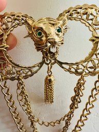 VINTAGE GOLD TONE GREEN EYED TIGER TASSEL AND SWAG BROOCH