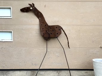 Garden Decor: A Tall, Whimsical Giraffe In Sheet Metal