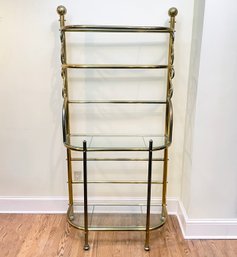 A Vintage Brass Baker's Rack With Glass Shelves