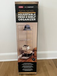 A Satin Nickel Adjustable Mesh Shelf Organizer