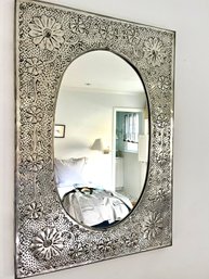 A Metal Embossed Mirror From India