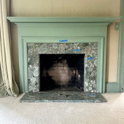 A Simple Wood Mantel With Distinctive Granite Surround And Hearth - Primary