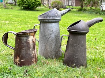 A Trio Of Vintage Oil Cans