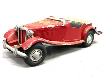 A Vintage Cast Aluminum Car By 'Model Toys'