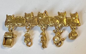 SIGNED AJC GOLD TONE CATS WITH DANGLING CHARMS BROOCH