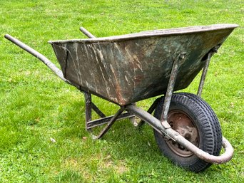 A Rustic Metal Wheelbarrow