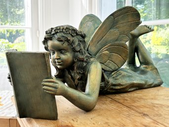 A Bronze Toned Sculpture: A Learned Fairy!