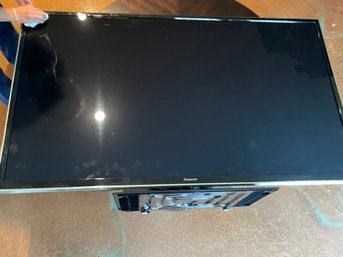 Panasonic Large Screen TV On Stand In Good Working Condition - Remote Included