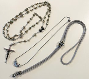 A Vintage Rosary And Two Costume Necklaces