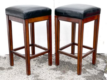 A Pair Of Modern Leather Bar Stools