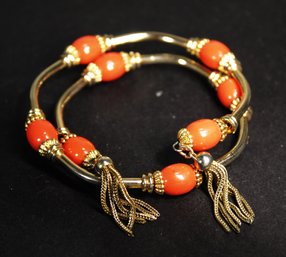 Vintage Gold Tone Orange Beaded 1960s Coil Bracelet Having Tassels