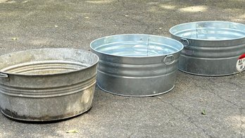 A Trio Of Galvanized Tubs