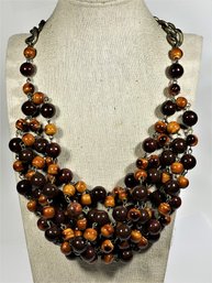 Gilt Metal Bib Necklace Having Pottery Beads Signed 'T'