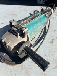 Makita 15 Amp Corded Angle Grinder With Grinding Wheel