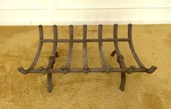 An Iron Fireplace Log Holder