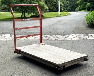 An Industrial Metal And Wood Cart