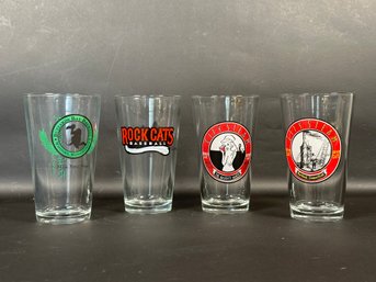 Four Branded Pint Glasses