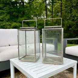 A Pair Of Chic Polished Metal Lanterns