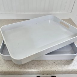 A Pair Of Crate And Barrel Melamine Trays