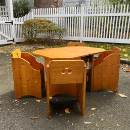 A Childrens Rectangular Table With 4 Chairs