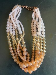 Multi-strand Beaded Peach/pink Necklace