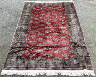 A Vintage Bokhara Hand Dyed And Knotted Wool Rug