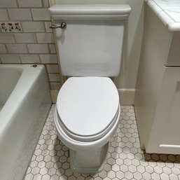 A Two-Piece Toto Toilet - Bath 3B