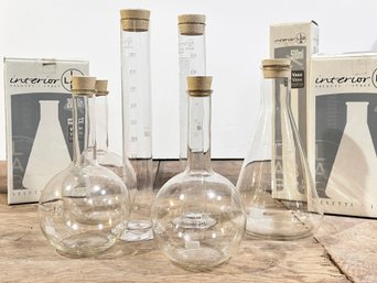 A Group Of Large Vintage Pyrex Beakers And Scientific Measuring Implements
