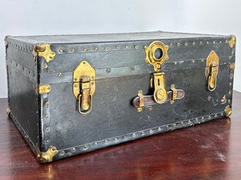 A Vintage Metal Traveling Trunk