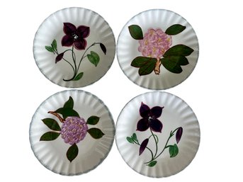 Four Floral Patterned Ribbon Edged Plates