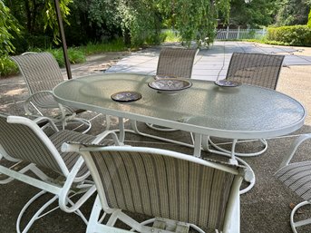 Oval Patio Table And 6 Swivel Rocker Chairs